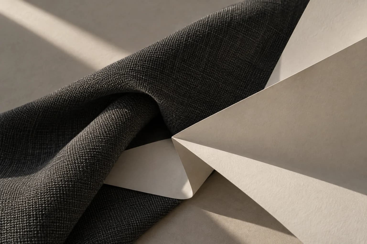 Original abstract charcoal textile and paper study; material direction, not a product specification